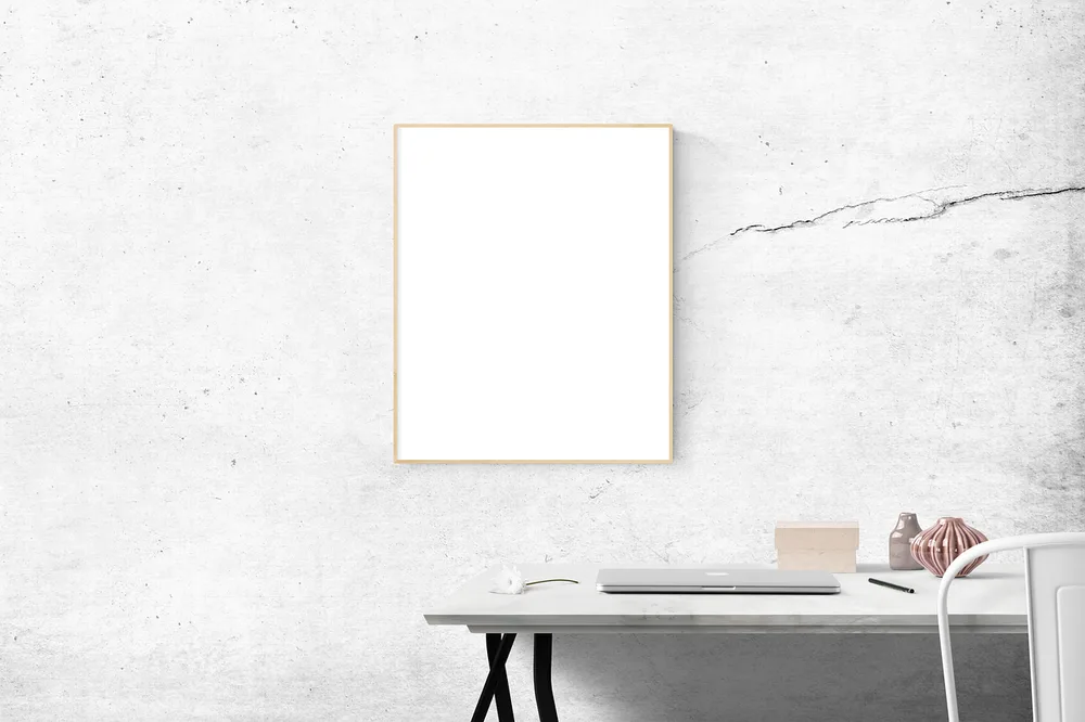 A white floating desk mounted on a bedroom wall with open floor below